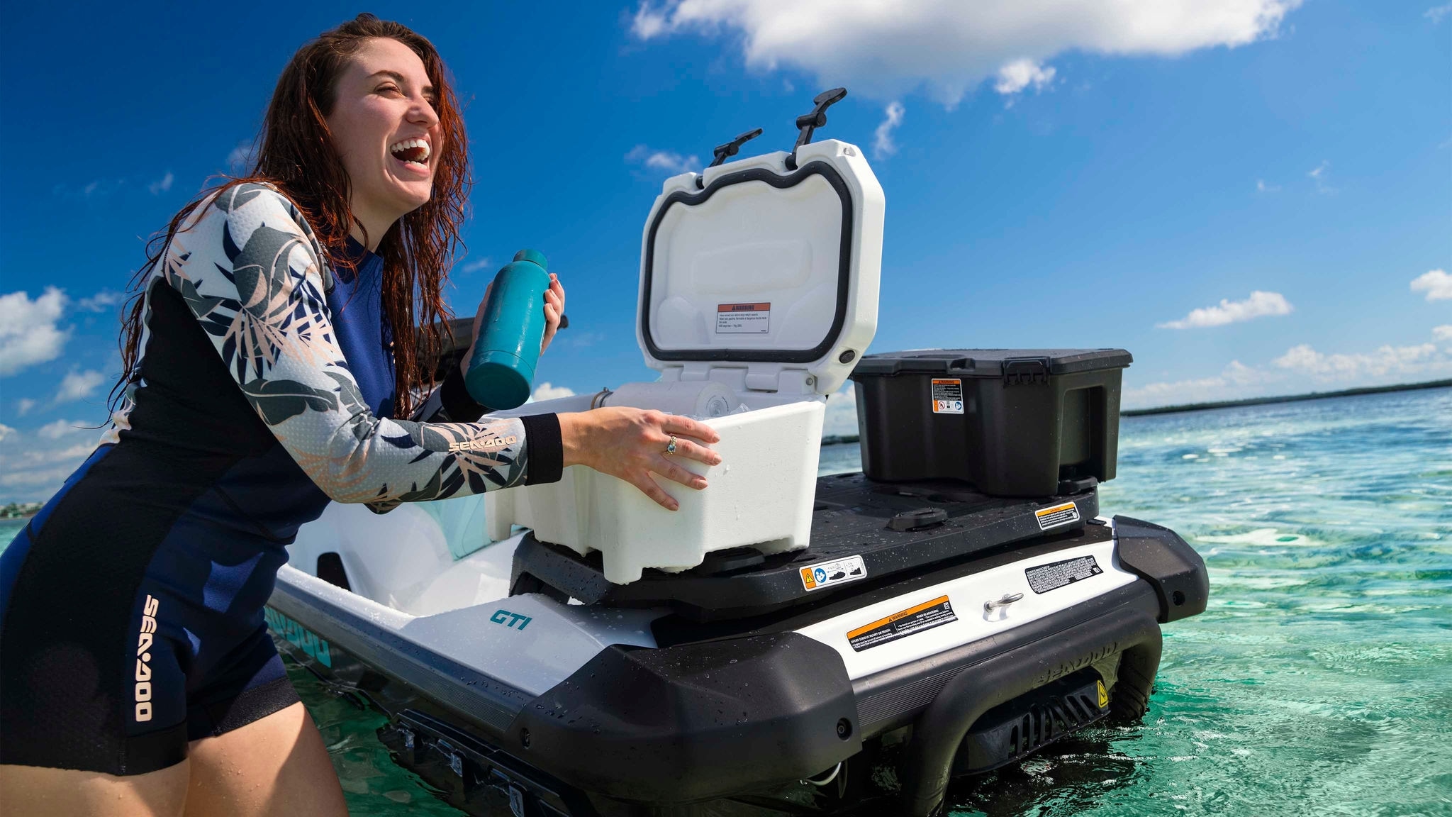 Woman opening Linq cooler