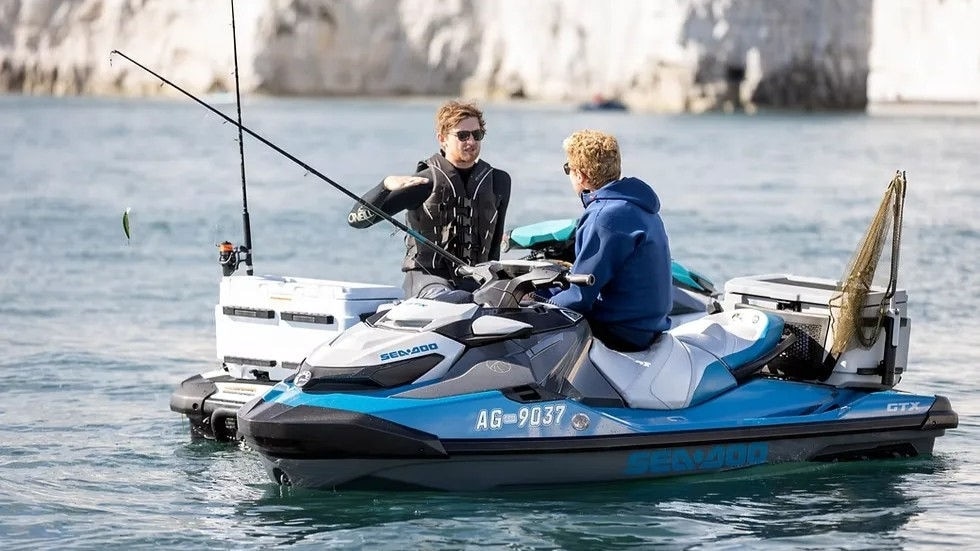 Two men fishing from their Sea-Doo personal watercrafts at Jurassic Coast