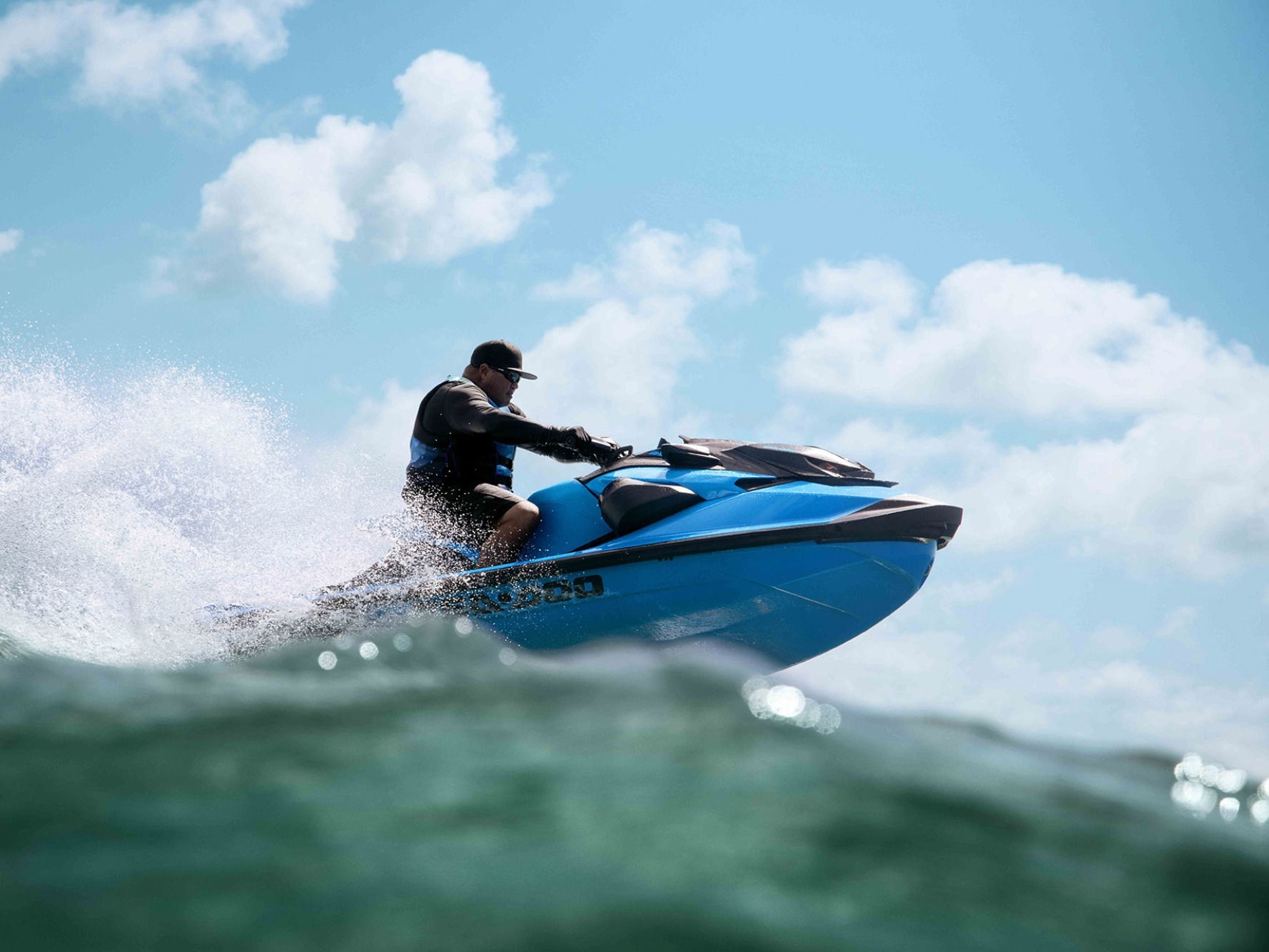 Man going at high speed on a Sea-Doo RXP-X