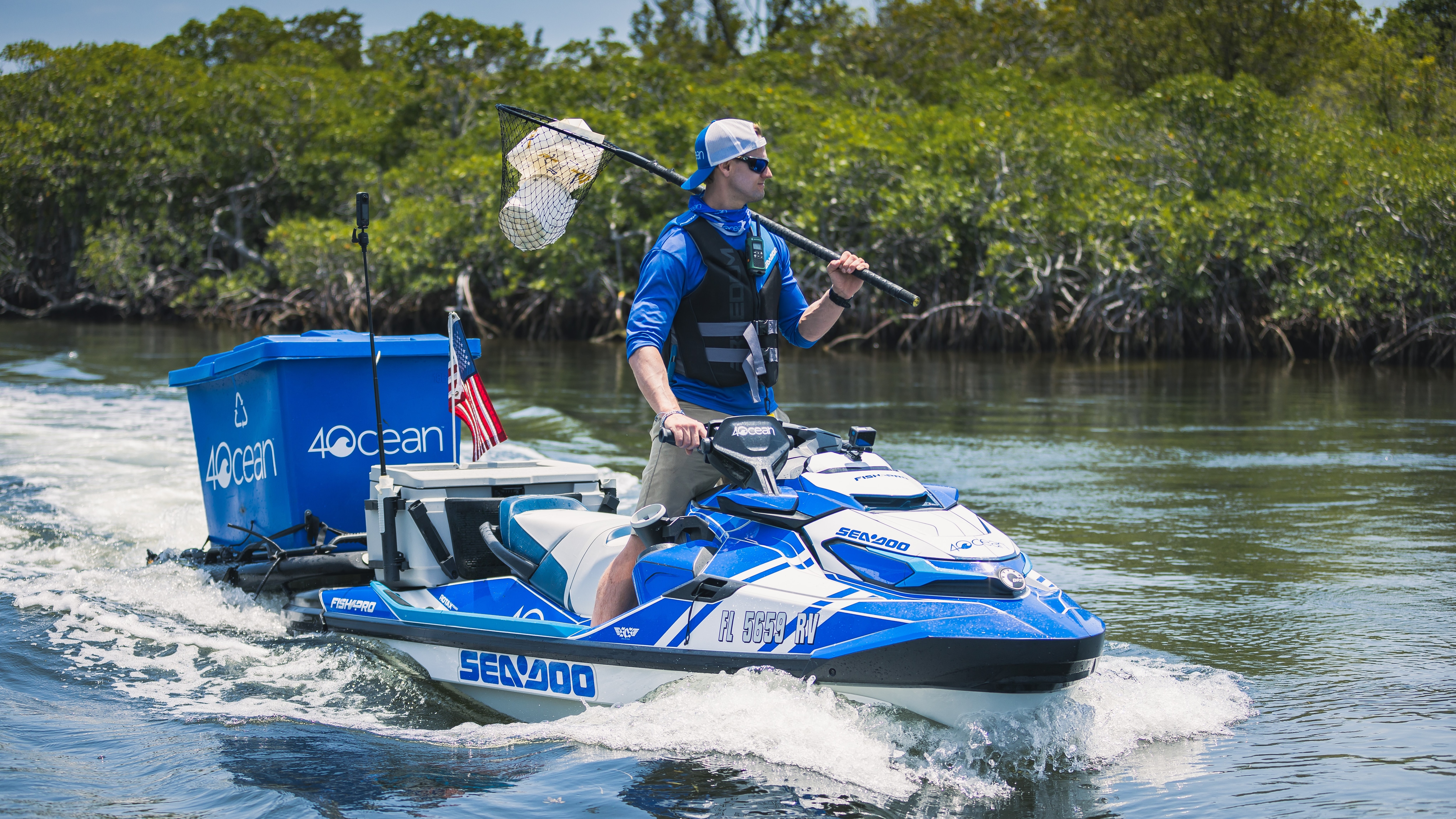 4ocean's Alex Schulze riding around a Sea-Doo FishPro personal watercraft