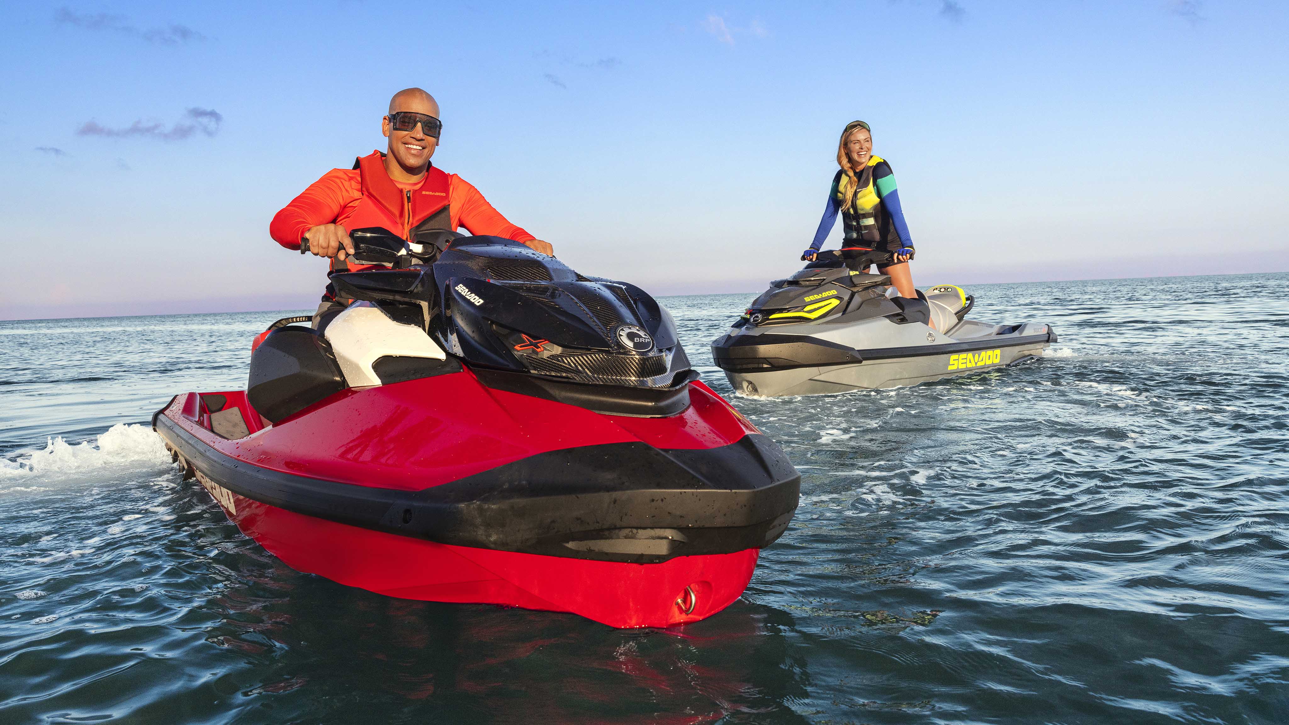 Two friends riding Sea-Doo personal watercrafts