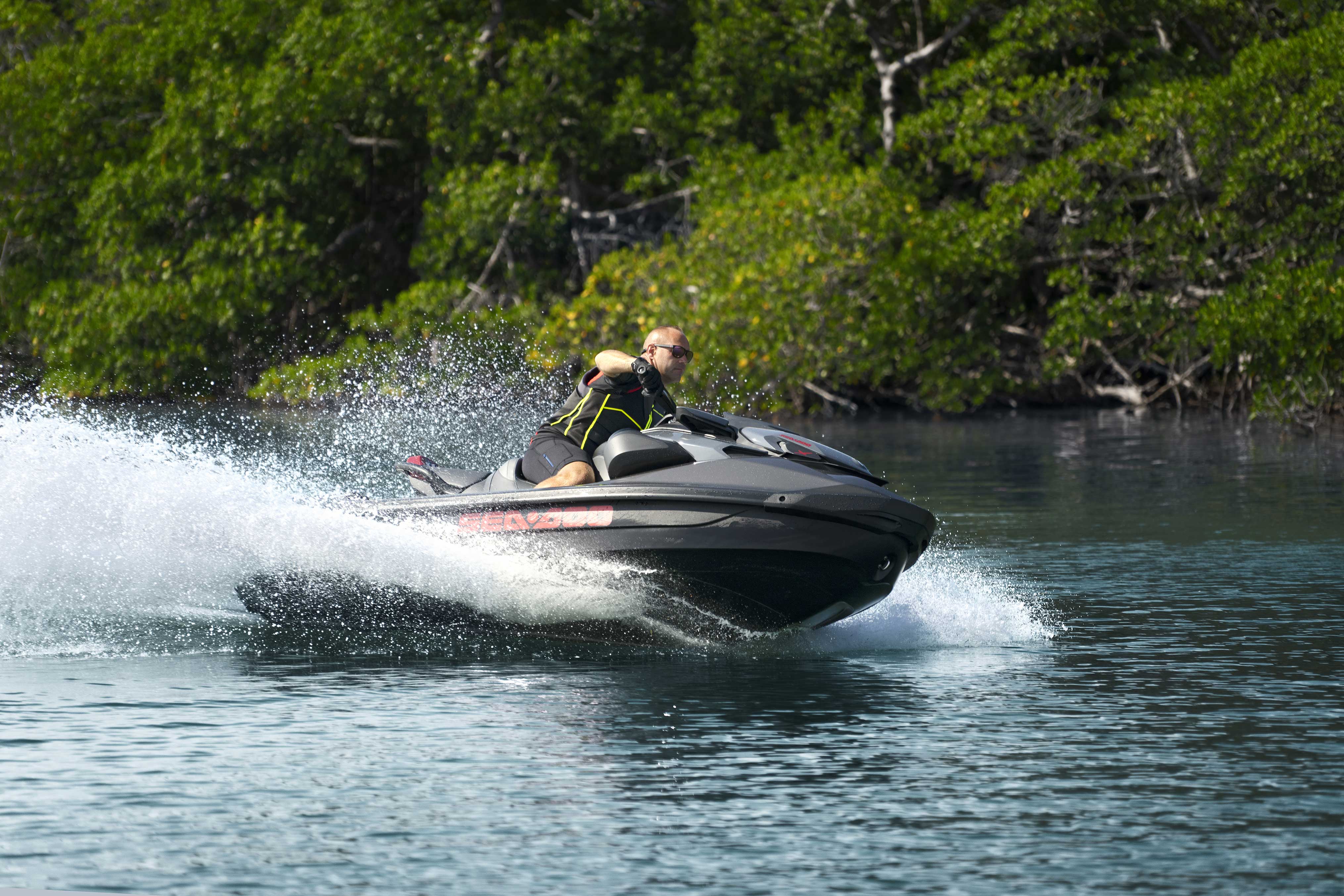 Woman riding standing up on the Sea-Doo RXT-X 325 2024