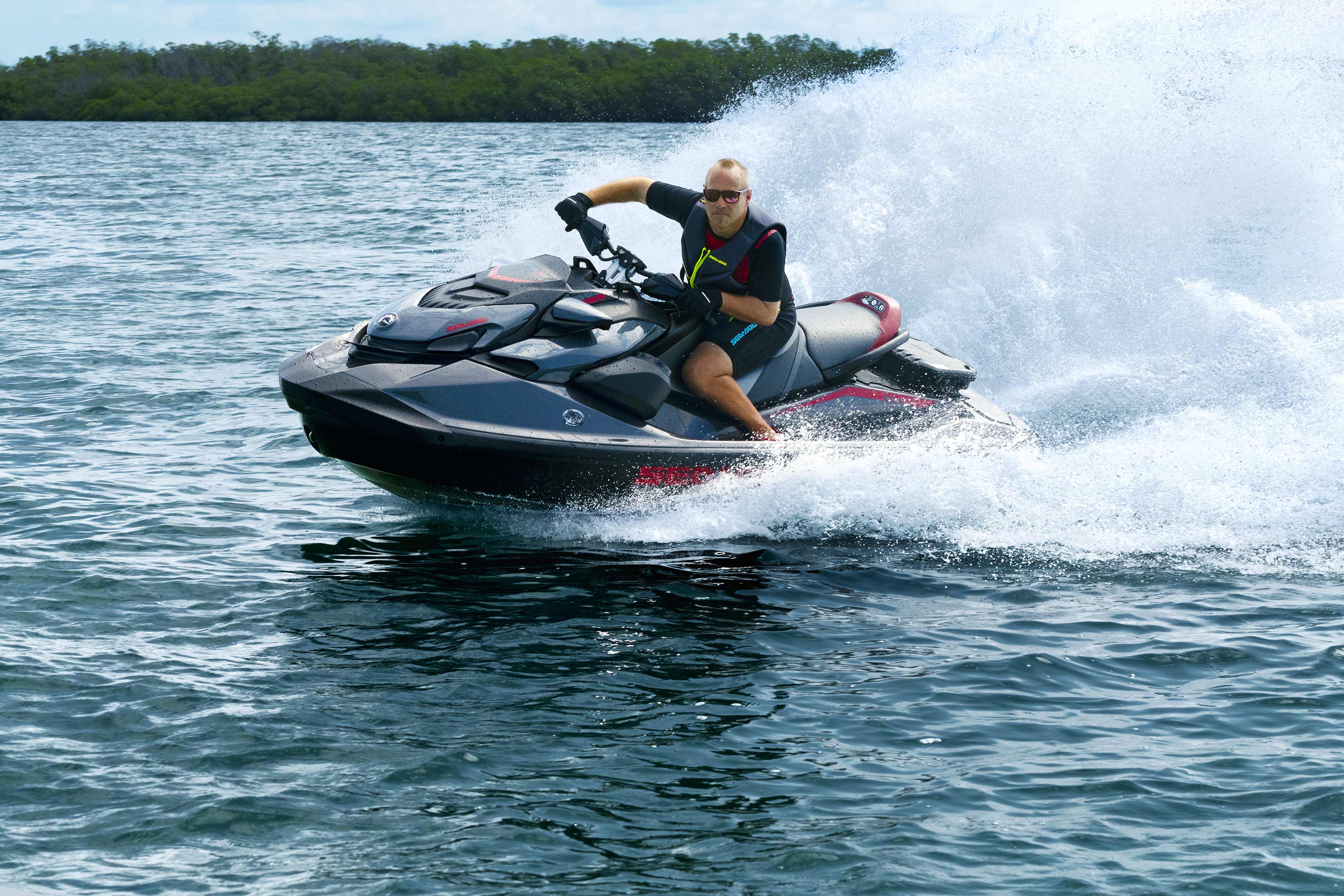 Man carving up the waves on a 2024 Sea-Doo GTR-X 300