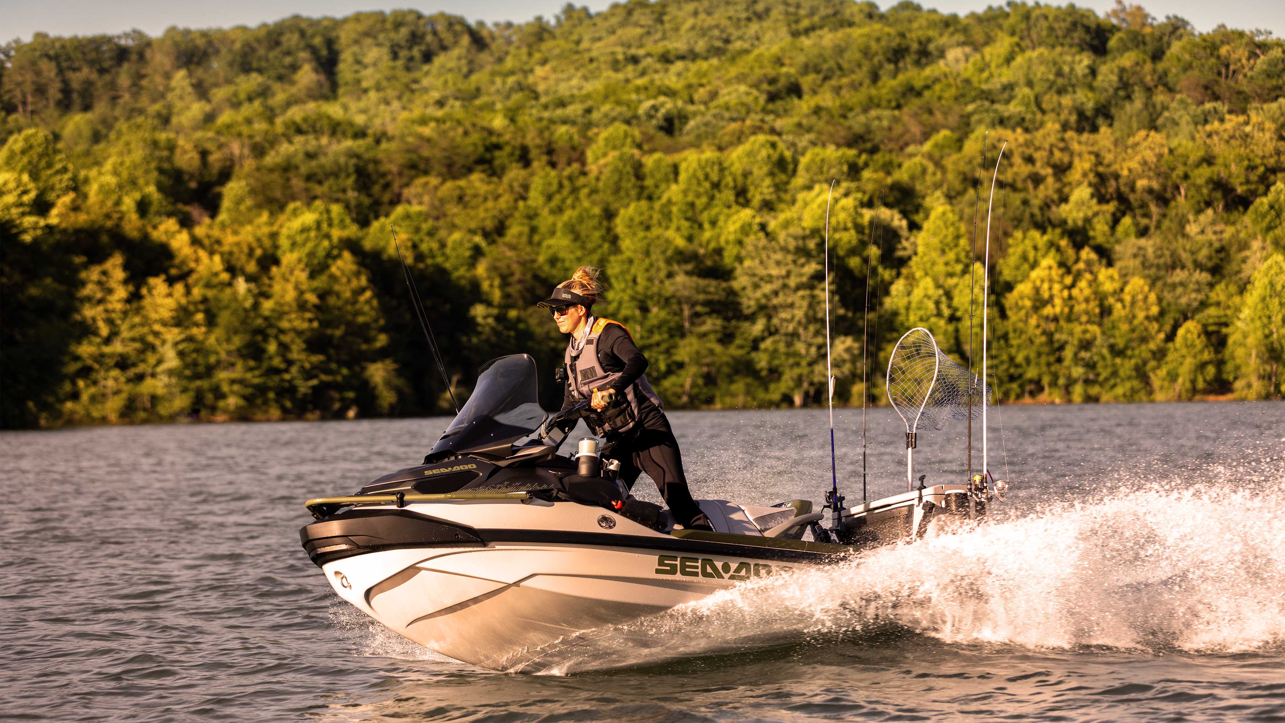 Woman riding the 2025 Sea-Doo FishPro Apex personal watercraft