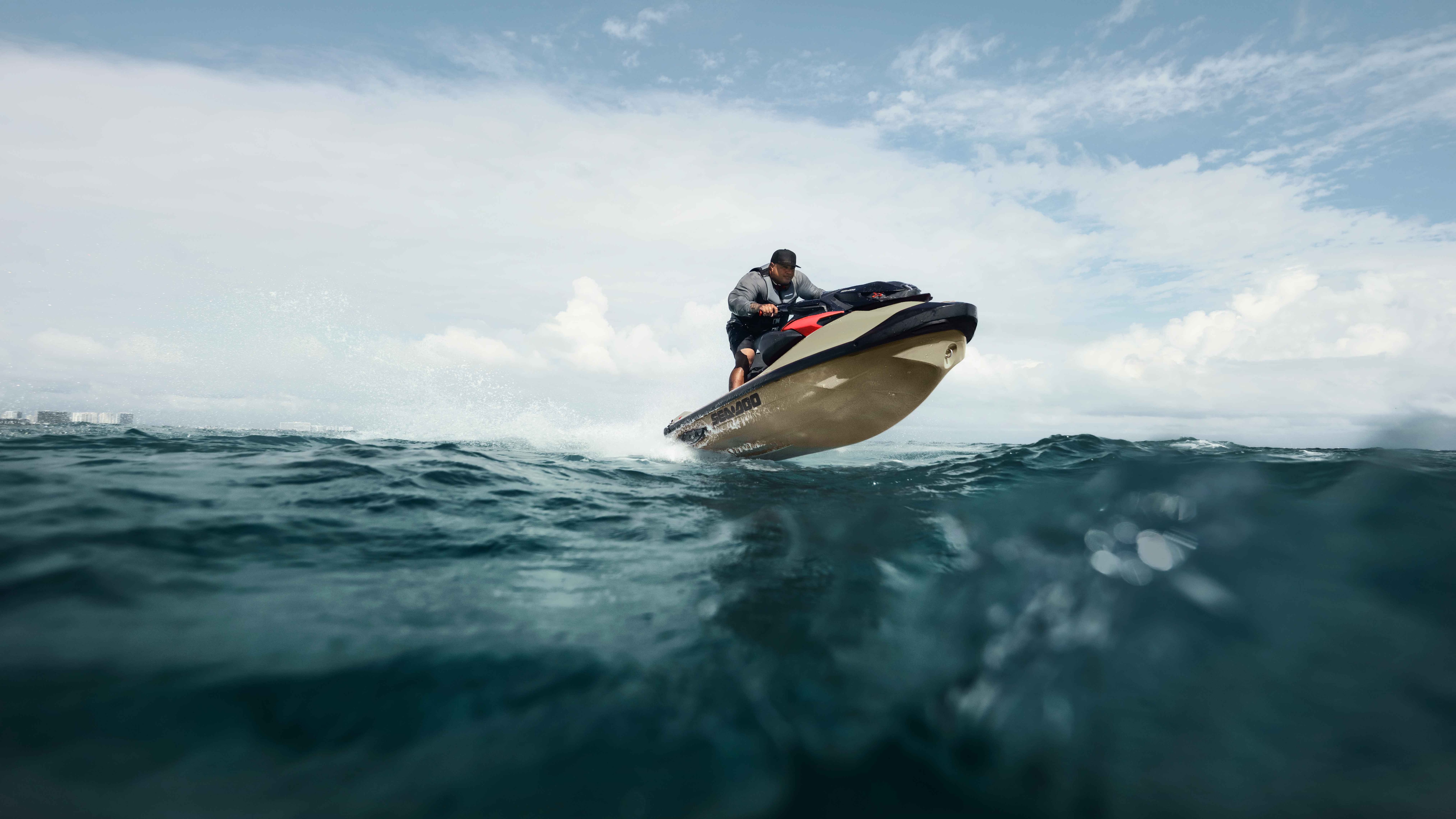 Man driving a 2024 Sea-Doo RXP-X personal watercraft