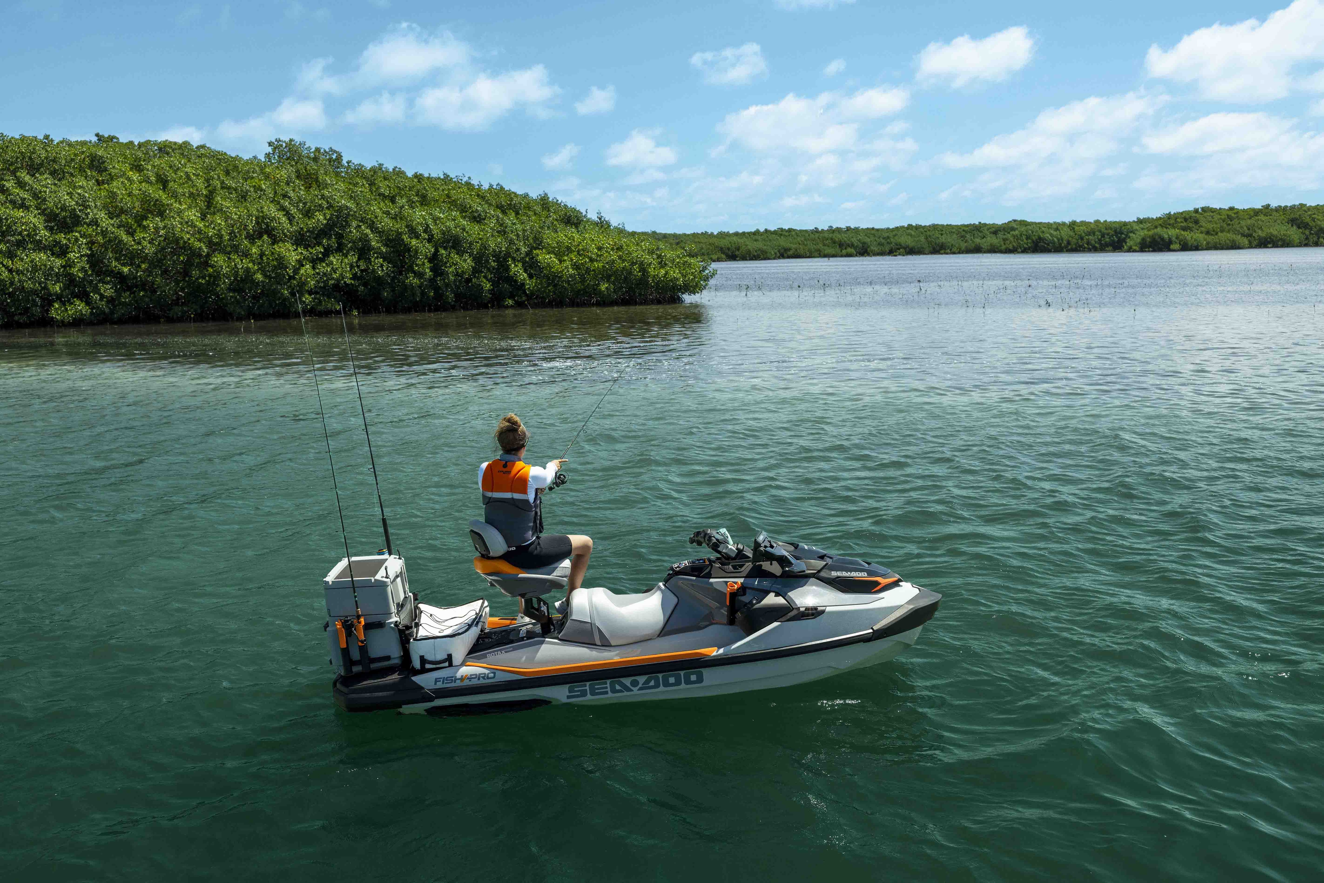 Woman riding a Sea-Doo FishPro Trophy