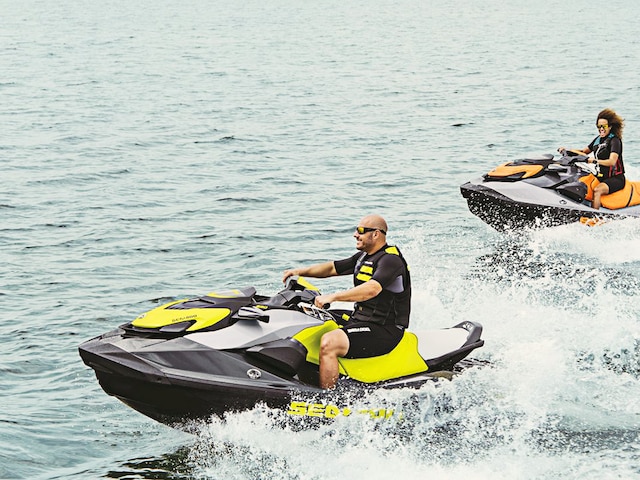 Two couples riding on Sea-Doo SPARK and GTI SE