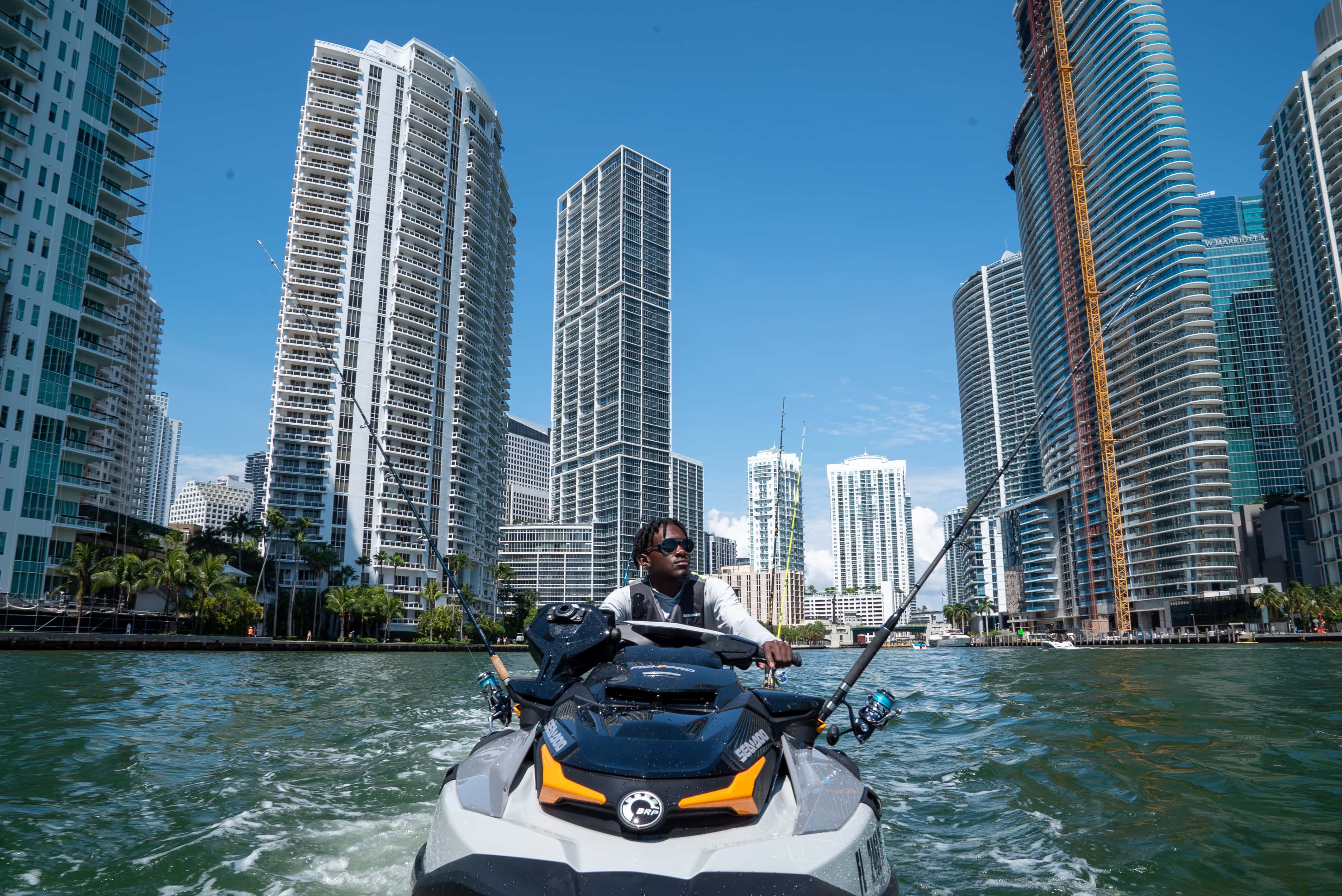 Emmanuel Williams on a Sea-Doo FISHPRO with city in background