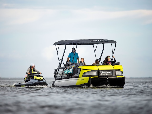 Group of friends enjoying the water with a Sea-Doo GTI and a Sea-Doo SWITCH
