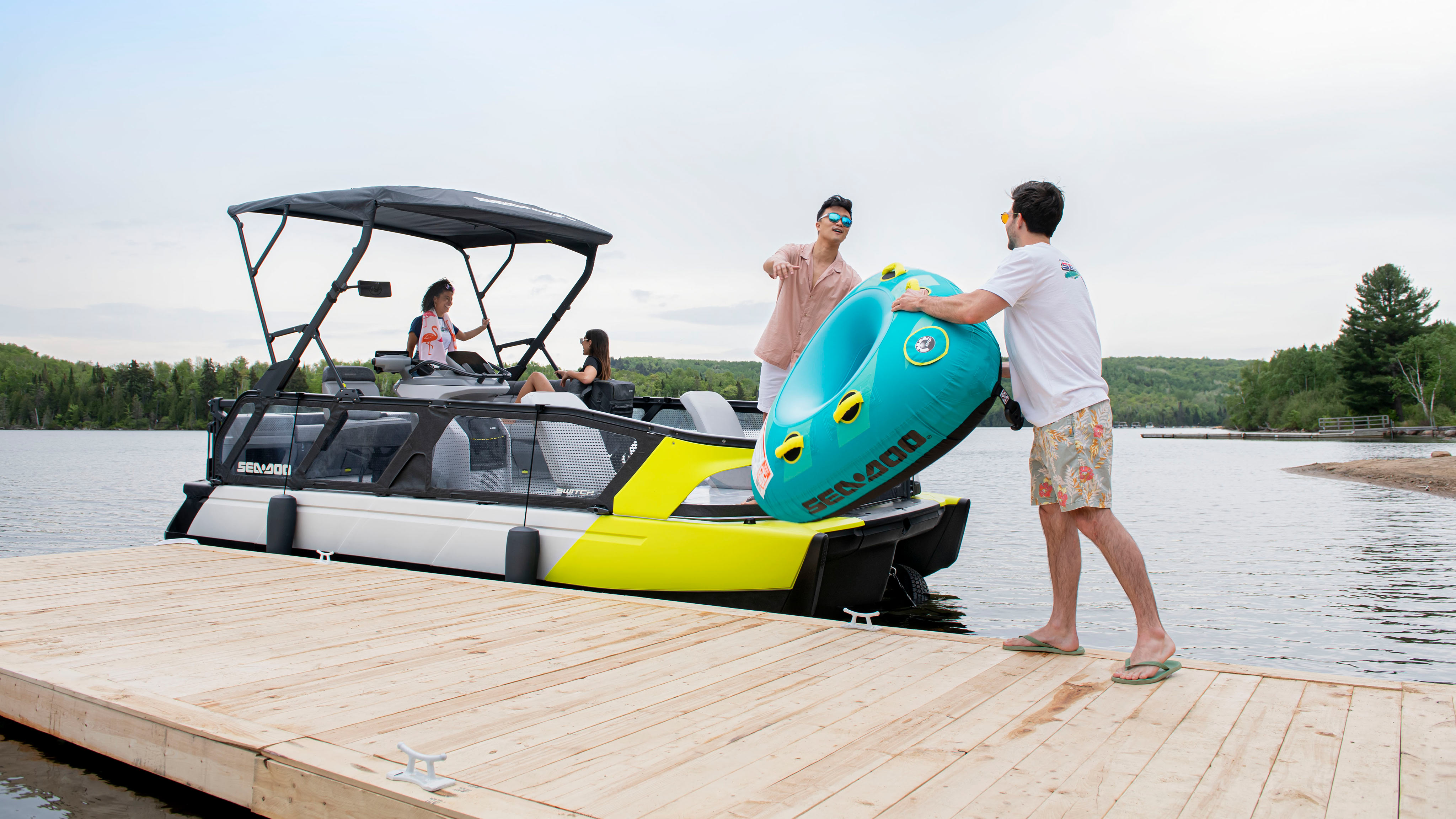 Group preparing a tube riding with a Seadoo SWITCH SPORT