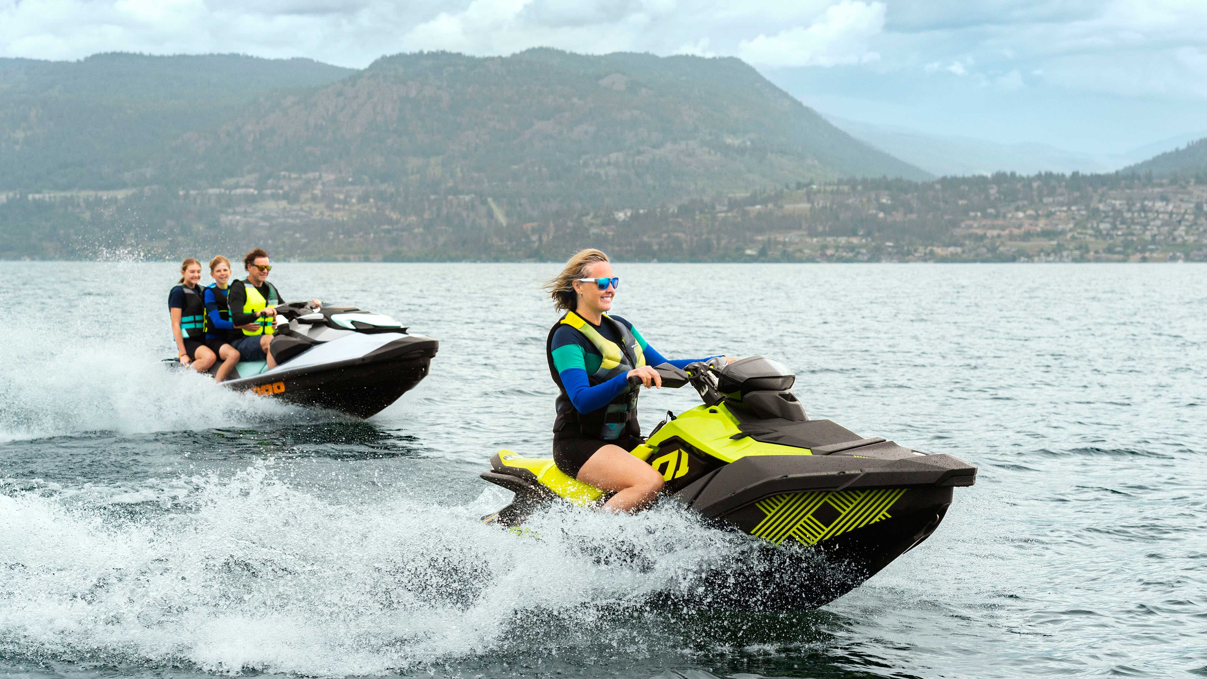 Mother on a Sea-Doo Spark Trixx followed by the rest of the family on a GTI SE