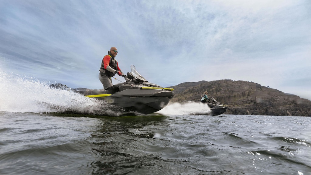 People riding Sea-Doo Explorer Pros