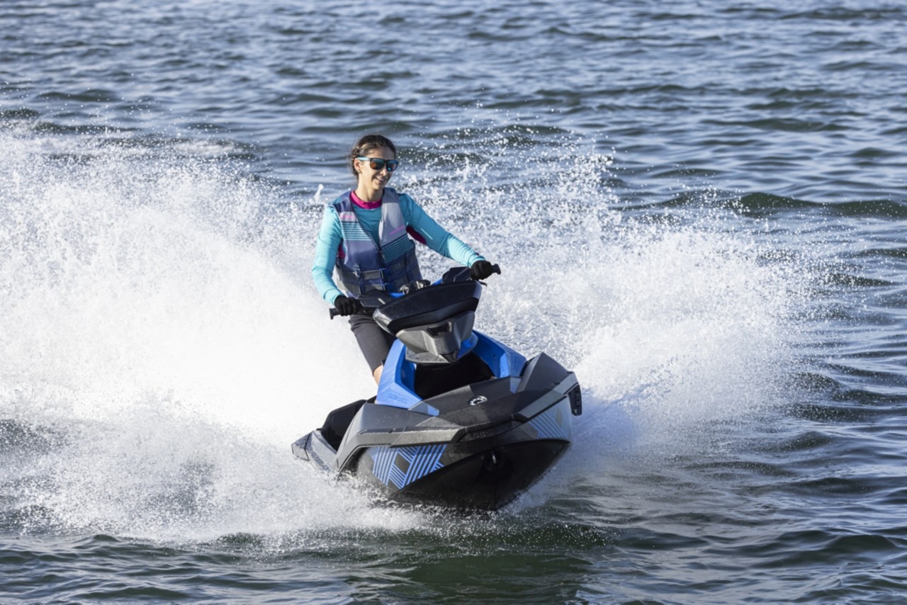 Woman enjoying her Sea-Doo Spark Trixx