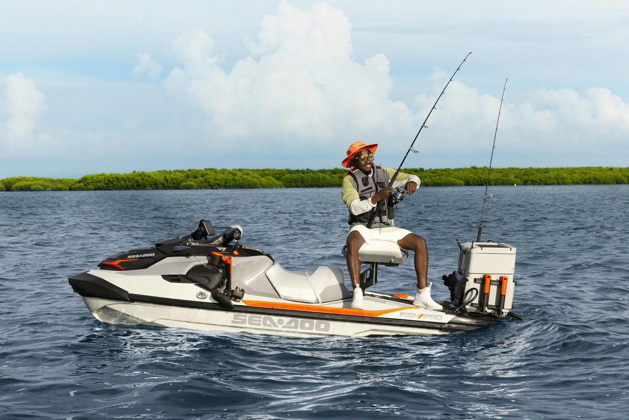 Premium Photo  Fisherman employs a fishing rod holder ensuring