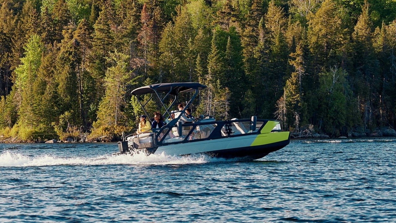 Group of friends doing tow sports with the Sea-Doo SWITCH SPORT pontoon