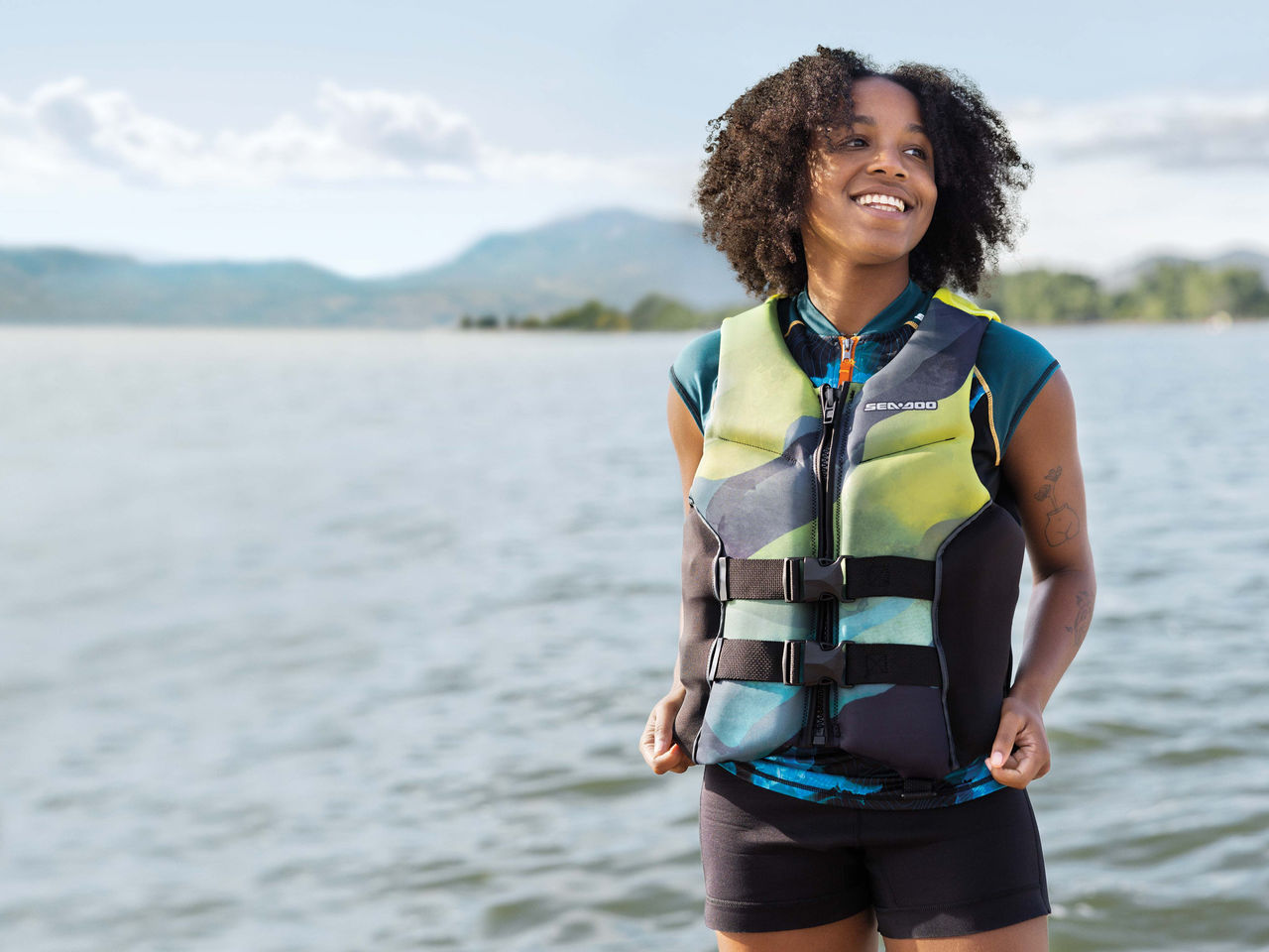 A lady wearing a Sea-Doo life jacket