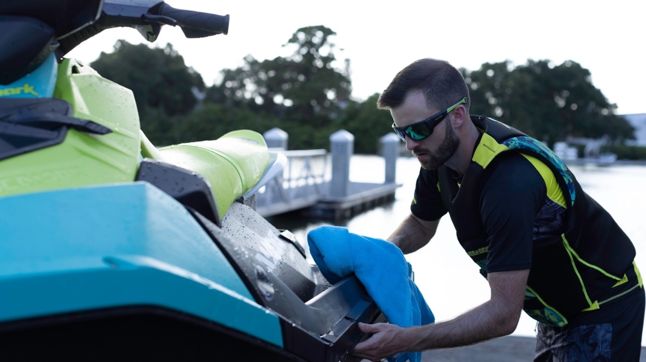 Men doing maintenance on his Sea-Doo watercraft
