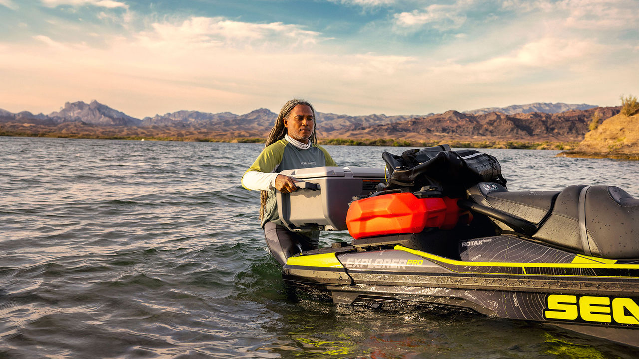 Sea-Doo watercraft with LinQ Waterproof Bag on beach in tropical setting