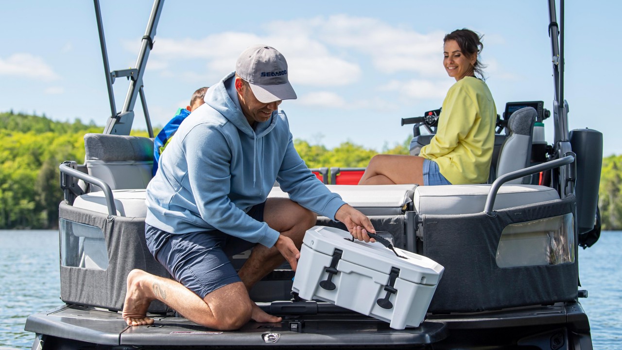 Man using the LinQ cooler on his Sea-Doo Switch