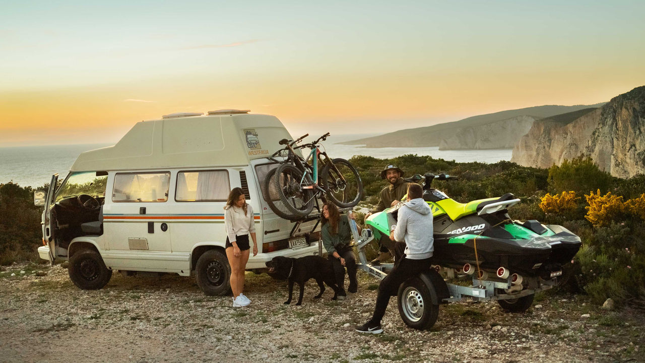 Orestis, John, Annie and Eva with their van and a Sea-Doo SPARK