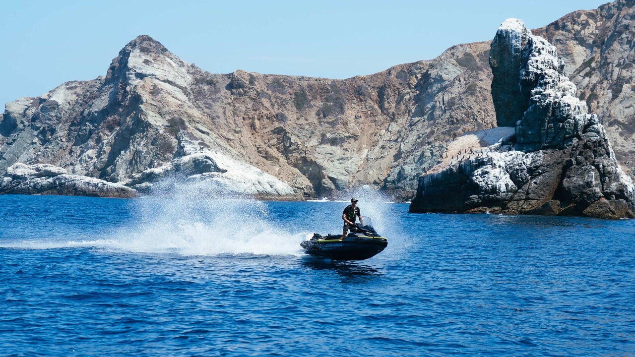 Man riding the Sea-Doo Explorer Pro 170